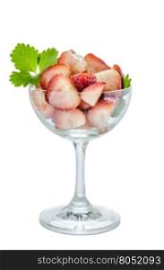 Fresh slices of strawberry in glass on a white background isolated. Fresh slices of strawberry in glass