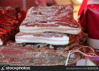 Fresh smoked bacon at a french market