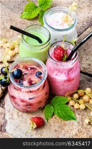 Fresh smoothie from currant. drink smoothies from currant in jar on a stone background