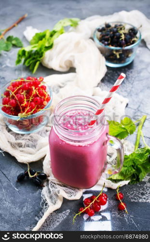 fresh smoothie with fresh berries on a table