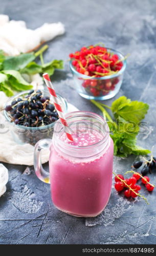 fresh smoothie with fresh berries on a table