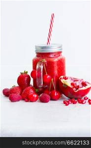 Fresh smoothy red drink in glass jars with igredients. Fresh smoothy red drink