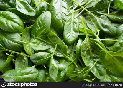 Fresh spinach leaves,  green vegetables, rustic style, healthy lifestyle, proper nutrition. Top view