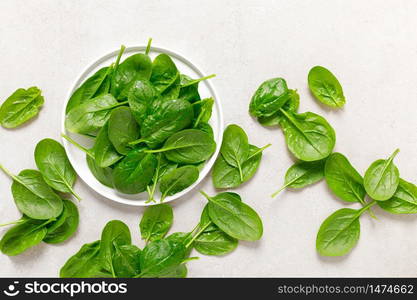 Fresh spinach leaves on white background