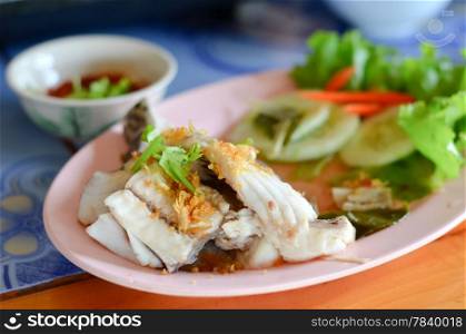 fresh steam fish with seafood sauce and vegetable