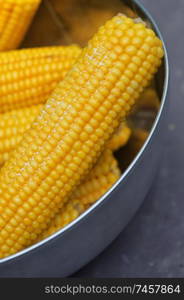 Fresh steamed corn and salt