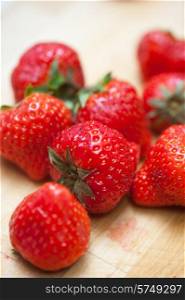 Fresh strawberries at wooden background. Fresh strawberries