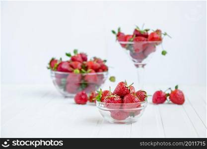 Fresh strawberries in a bowl on a white background. Top viewpoint.. Fresh strawberries in a bowl on a white background.