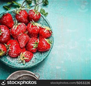 Fresh Strawberries in blue bowl , top view, place for text