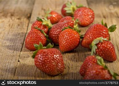 fresh strawberries on wood.