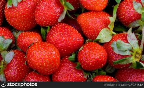 Fresh strawberries spinning. Healthy eating concept. Fresh fruits background.
