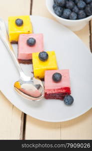 fresh strawberry and mango mousse dessert cake with blueberry