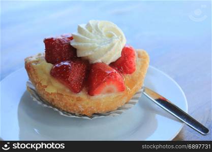 Fresh strawberry confectionery, outside on a table