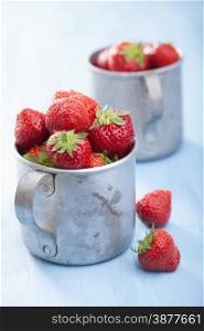 fresh strawberry in old cups