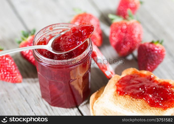 Fresh strawberry jam with toast for breakfast