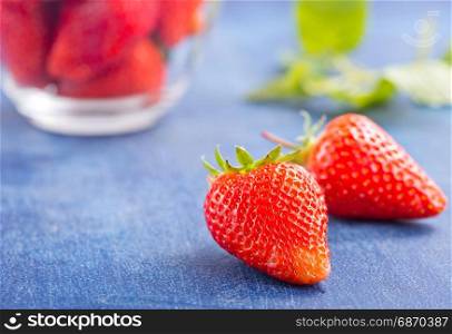 fresh strawberry on blue table, stock photo