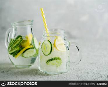 Fresh Summer Drink. Healthy detox fizzy water with lemon and cucumber in mason jar. Healthy food concept. Detox diet.