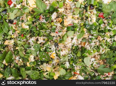 Fresh summer style fried rice with spring onions, egg, chicken and garden herbs