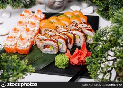 Fresh sushi traditional japanese food on big plate