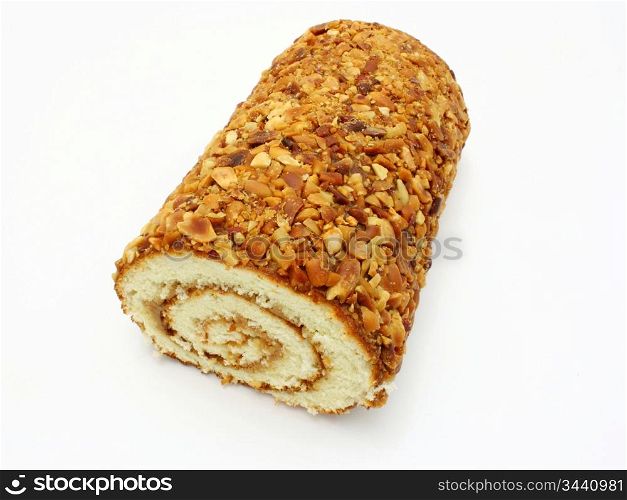 Fresh swiss roll with poppy isolated on white background
