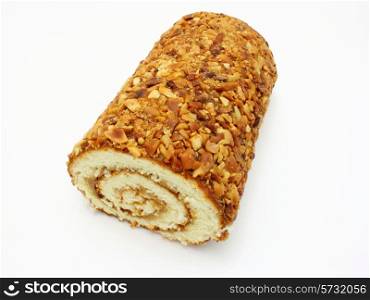 Fresh swiss roll with poppy isolated on white background
