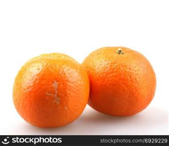 Fresh tangerine fruits on a white background