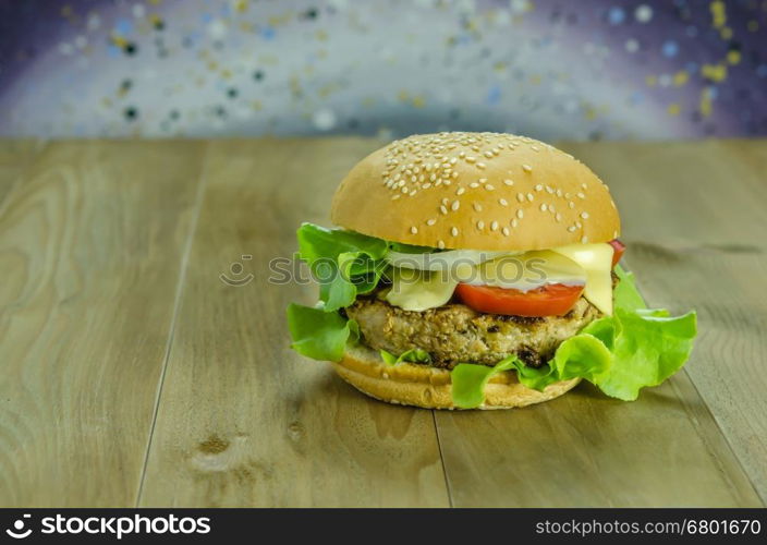 fresh tasty burger . Closeup of home made burgers on wooden background