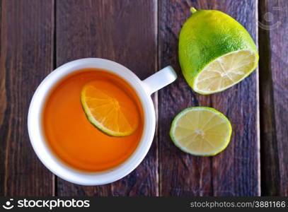 fresh tea with lemon in white cup