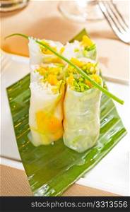fresh tipycal vietnamese style summer rolls,on a palm leaf