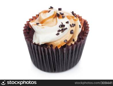 Fresh toffee cupcake muffin with caramel and chocolate on white background