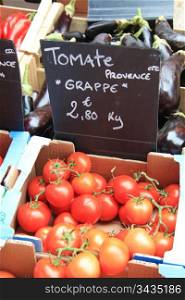 Fresh tomatoes and eggplants on a local market in the Provence, France