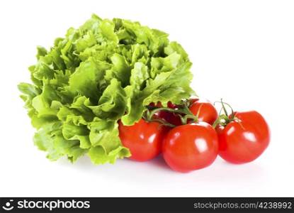 Fresh tomatoes and lettuce isolated over white background