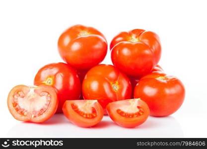 Fresh tomatoes isolated on white.