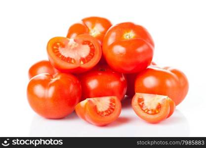 Fresh tomatoes isolated on white.