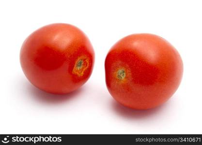 Fresh tomatoes isolated on white background