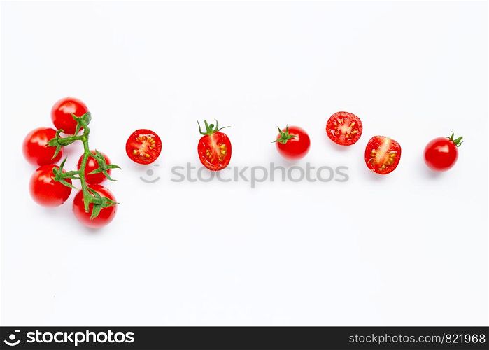 Fresh tomatoes, whole and half cut isolated on white background. Copy space