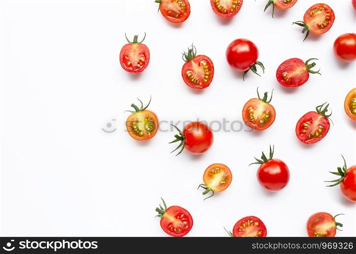 Fresh tomatoes, whole and half cut isolated on white background. Copy space