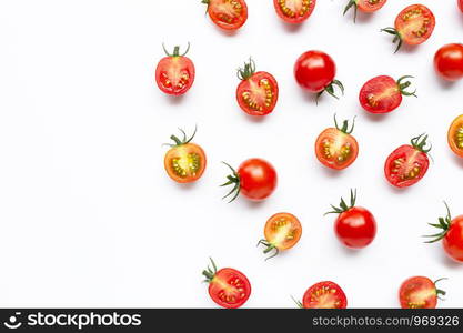 Fresh tomatoes, whole and half cut isolated on white background. Copy space