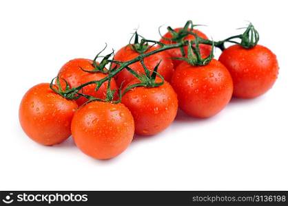 Fresh tomatoes with drops of water