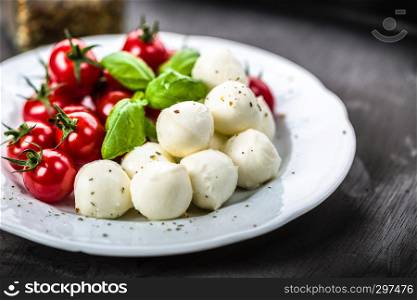 Fresh tomatoes with mozzarella and fresh basil