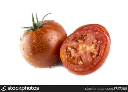 fresh tomatoes with Sliced ??tomatoes on white background.