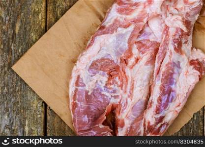 Fresh uncooked raw sliced meat Raw pork on cutting board. Raw pork on cutting board Fresh uncooked raw sliced meat