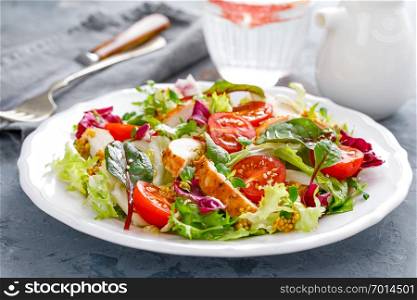 Fresh vegetable salad with grilled chicken meat