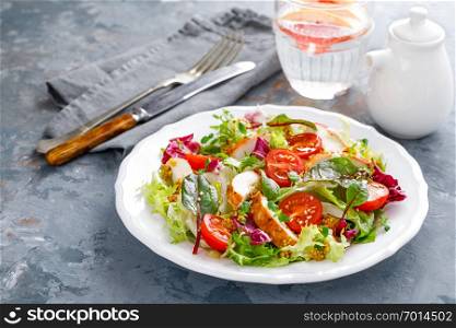 Fresh vegetable salad with grilled chicken meat
