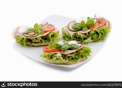 Fresh vegetable sandwiches on pitta bread - isolated