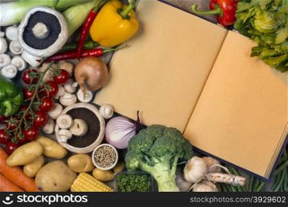 Fresh vegetables and recipe book with blank pages - Space for your Text