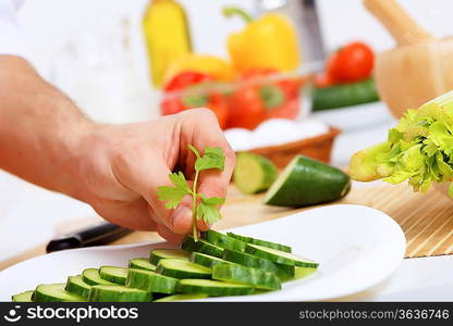 Fresh vegetables being cut with a knife