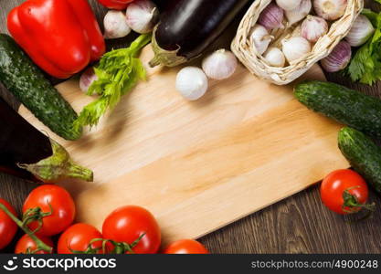 Fresh vegetables. Close up of various vegetables on wooden cutting board