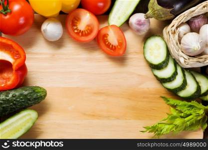 Fresh vegetables. Close up of various vegetables on wooden cutting board