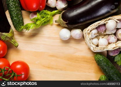 Fresh vegetables. Close up of various vegetables on wooden cutting board